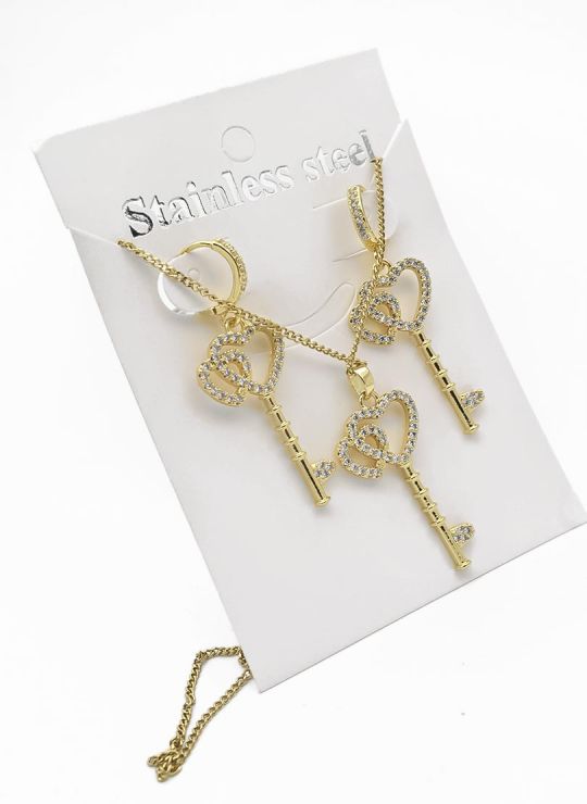 SET DE COLLAR, DIJE Y ARETES EN RODIO CON MICROCIRCIONES  INCLUYE CADENA FRAMBUESA 