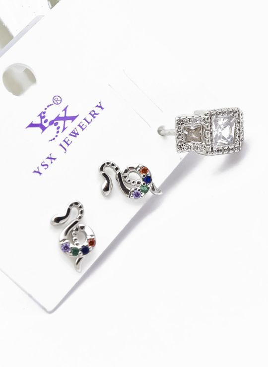SET DE ARETES 1 PAR Y SOLITARIO TENDENCIA XUPING/ RODIO  