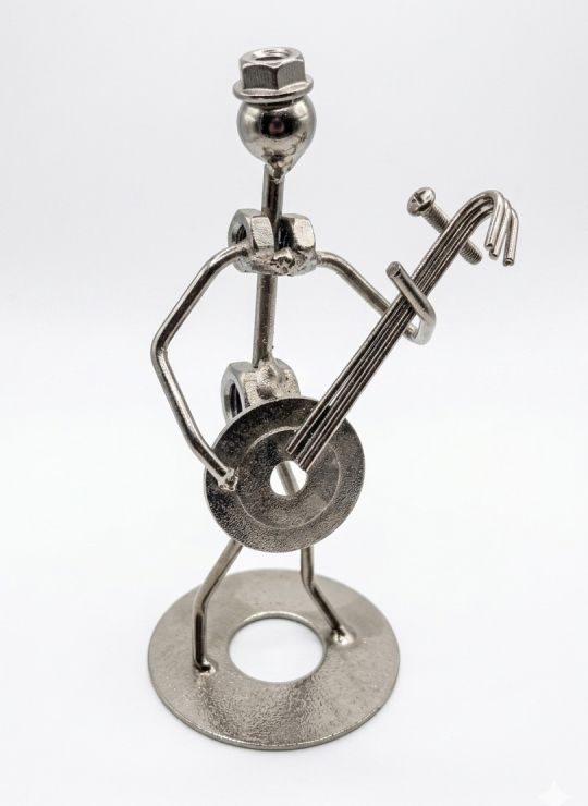 ADORNO METALICO ESPECIAL MUSICO PARA ESCRITORIO 16CMS 